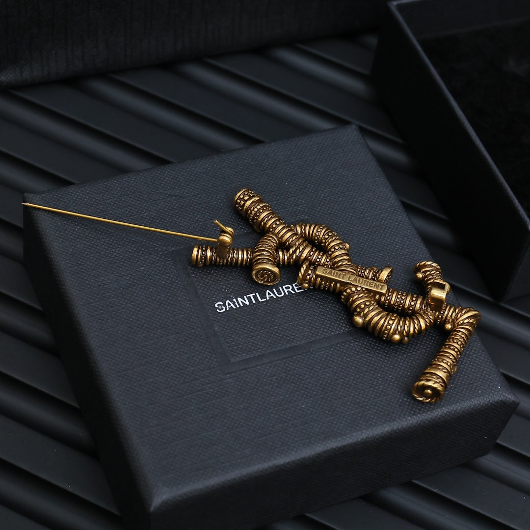 Coiled Wire Letter Emblem Brooch