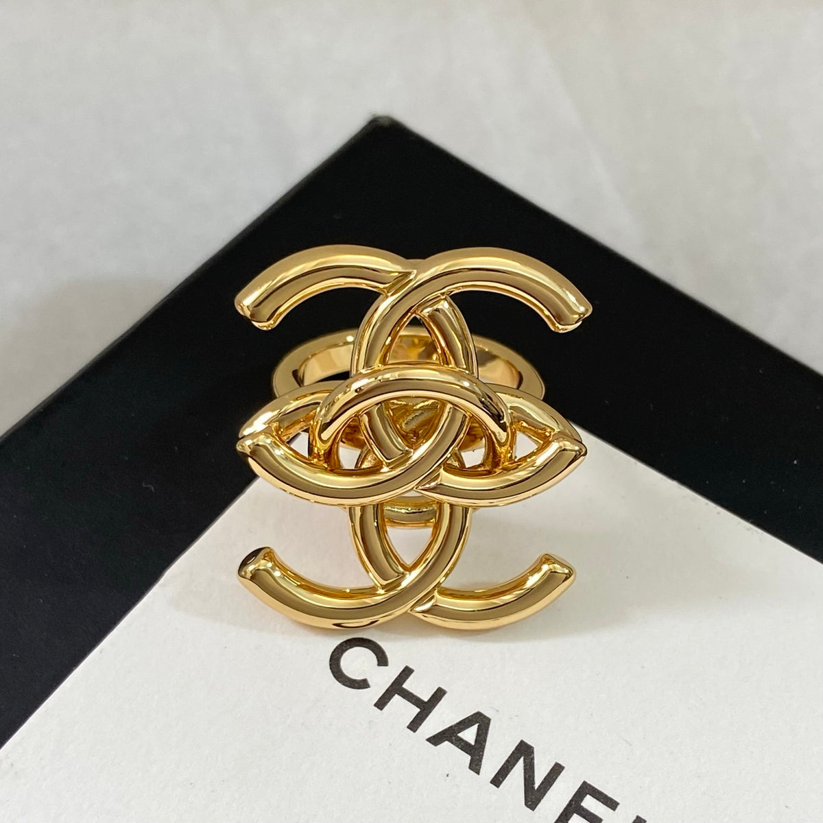 Polished Interlocking Emblem Statement Ring