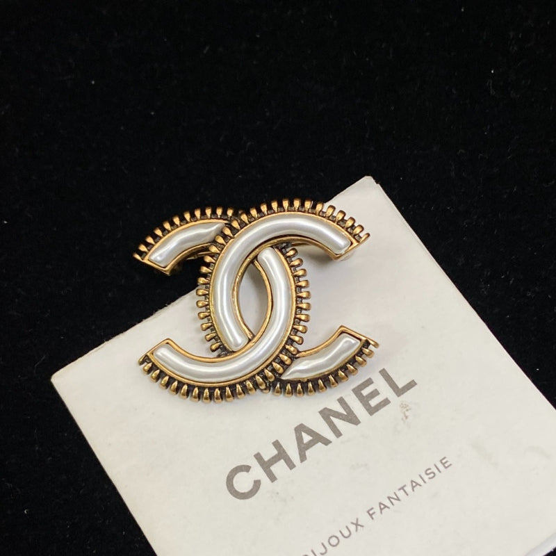 Curved Emblem Brooch with White Inlay