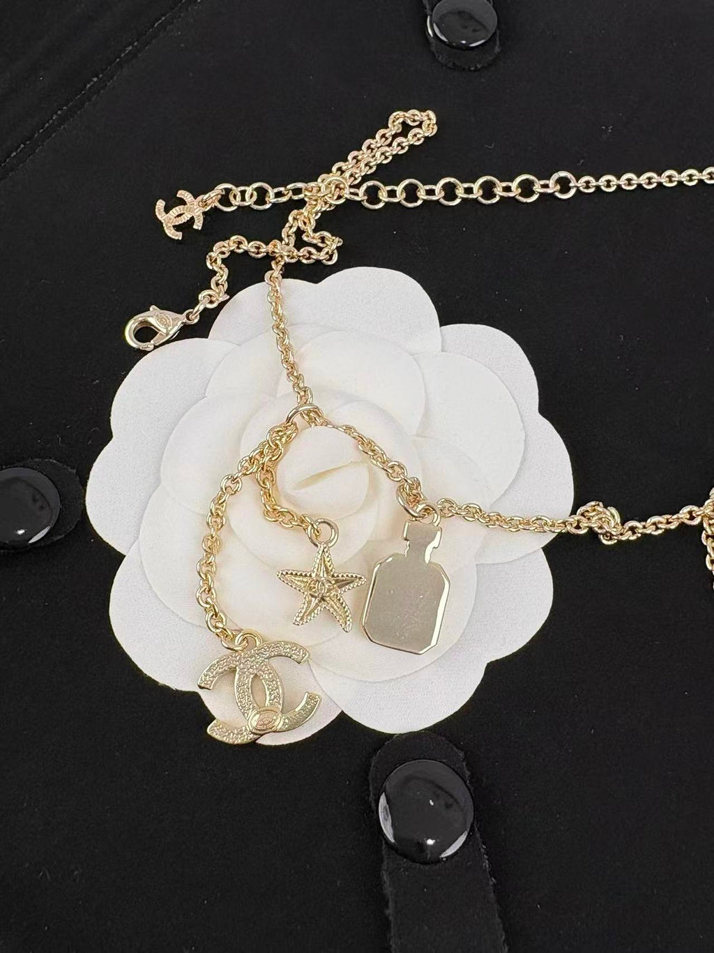 Gold Tone Multi-Charm Long Sweater Necklace, Perfume Bottle & Starfish Pendants
