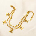 Pulsera de doble cadena con dije de monograma en acero inoxidable 304