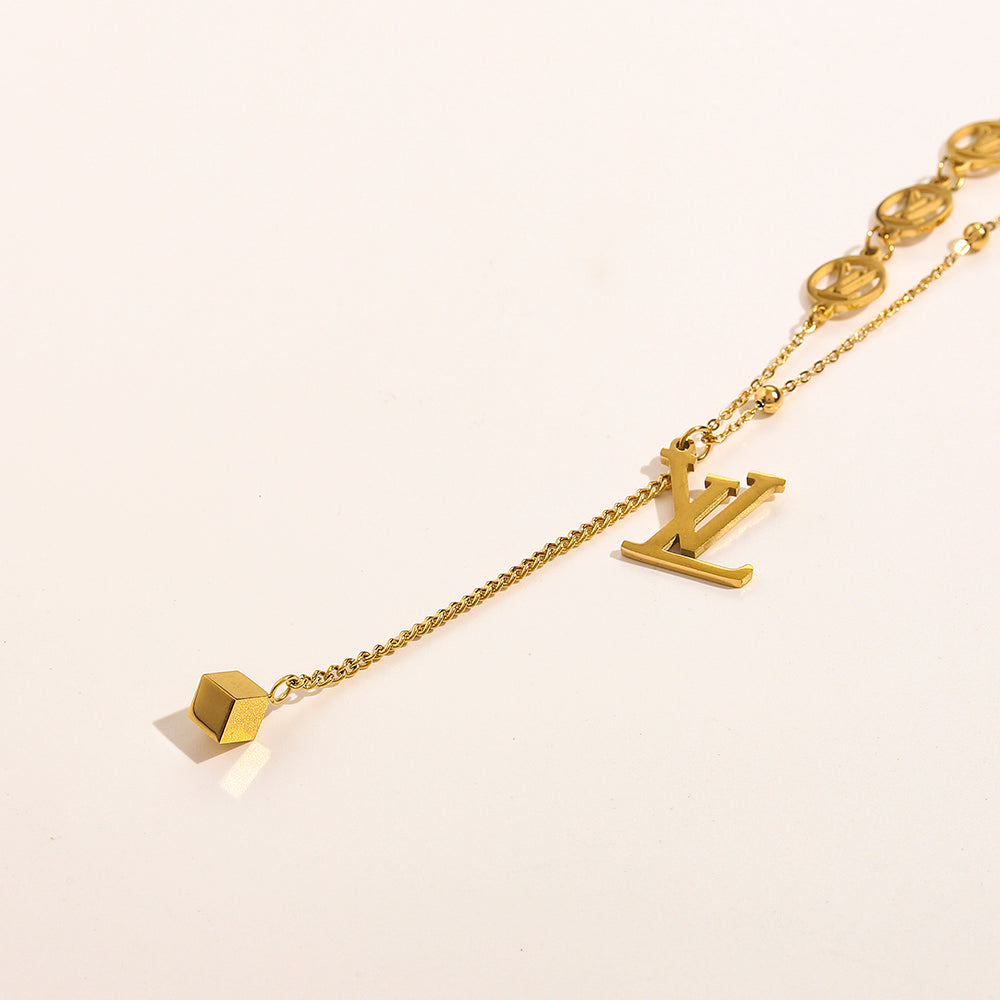 Collar tipo Y con inicial de acero inoxidable 304 y dije de corazón