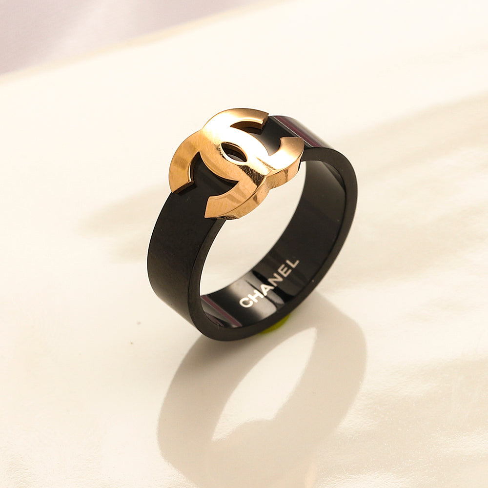 Black Wide Band Ring with Raised Emblem