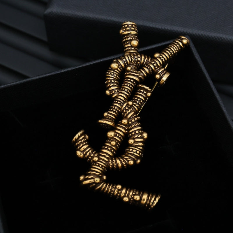 Coiled Wire Letter Emblem Brooch