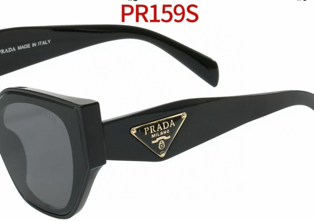 Rounded Cat-Eye Sunglasses with Ornate Patterned Temples