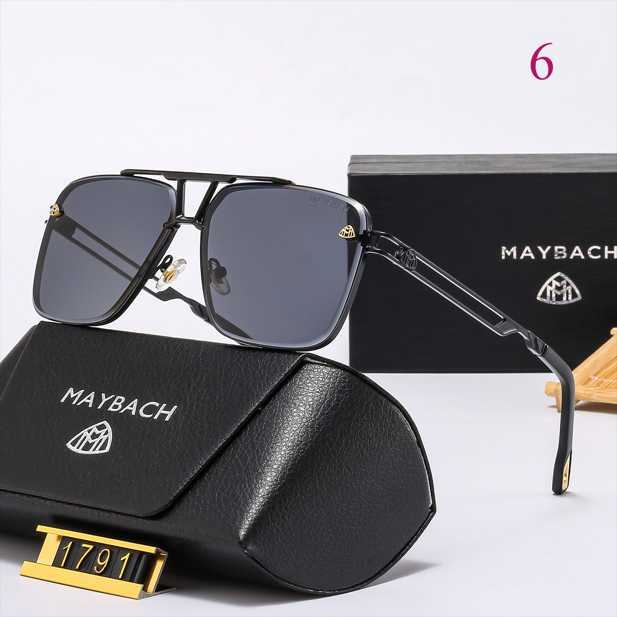Gafas de sol geométricas estilo aviador con patillas metálicas troqueladas