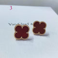 Boucles d'oreilles puces en forme de trèfle à quatre feuilles bordées de perles