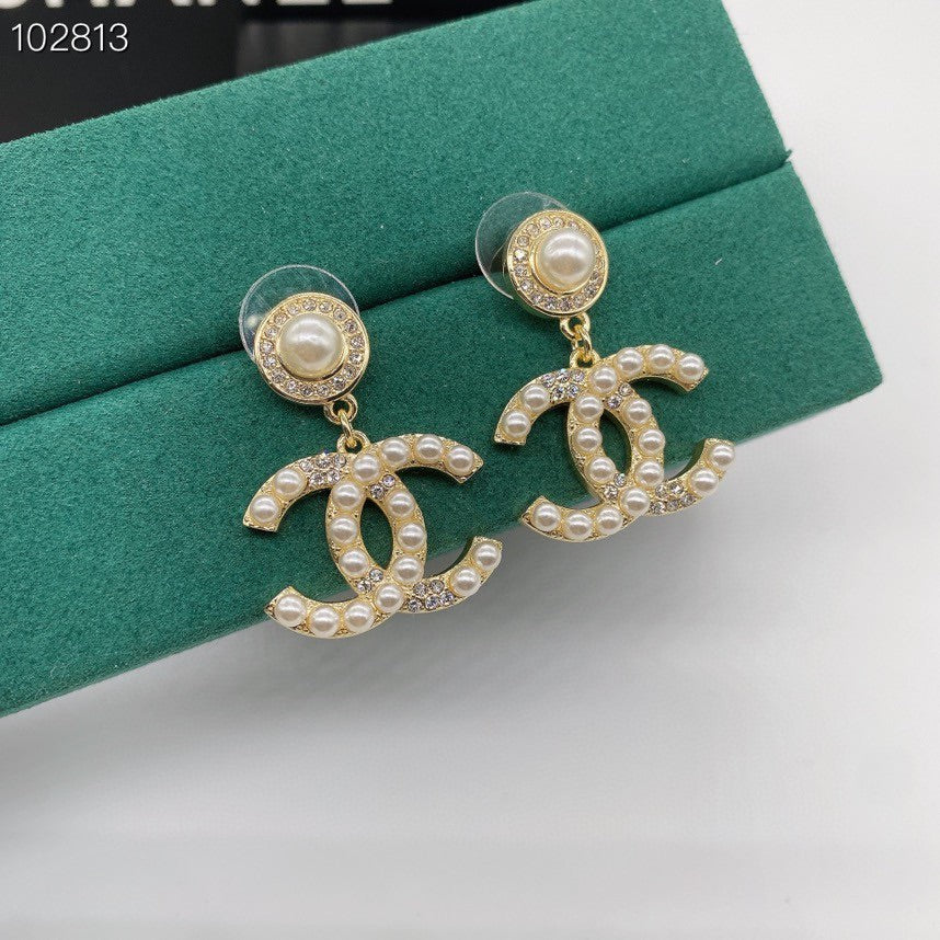 Boucles d’oreilles pendantes à fermoir en C entrelacé, effet nacré et texturé