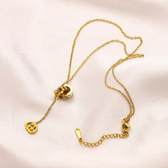 Collar de lazo con monograma redondo de acero inoxidable 304