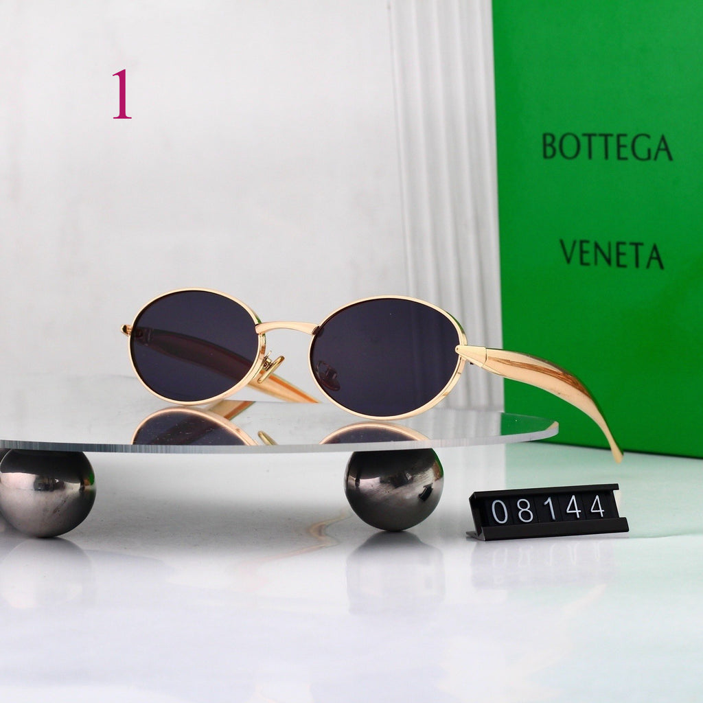 Gafas de sol redondas con patillas de metal texturizado