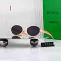 Gafas de sol redondas con patillas de metal texturizado
