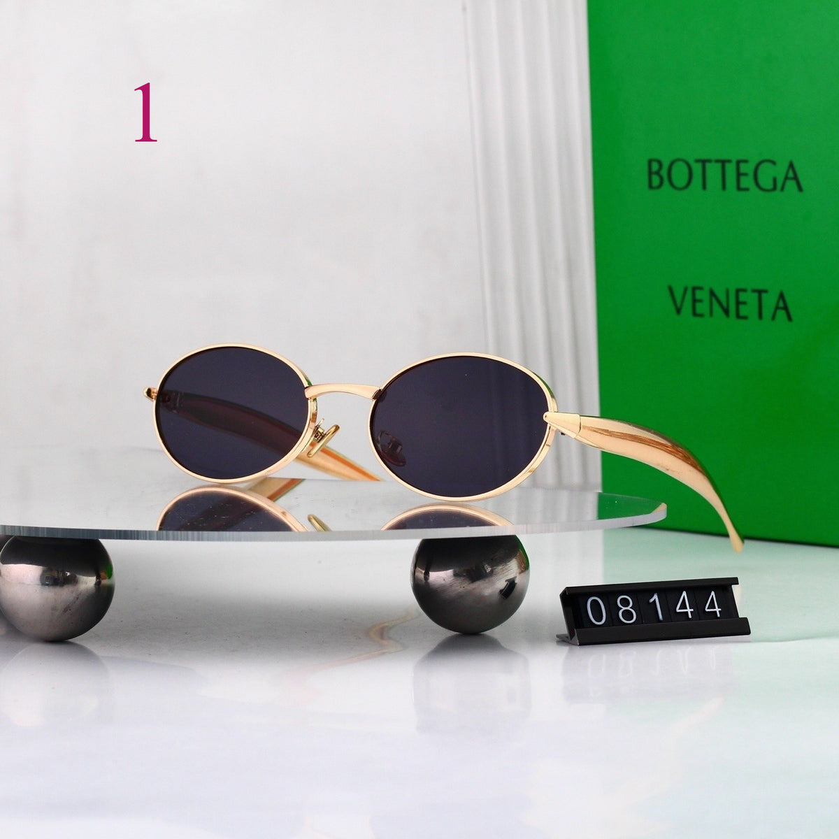 Gafas de sol redondas con patillas de metal texturizado
