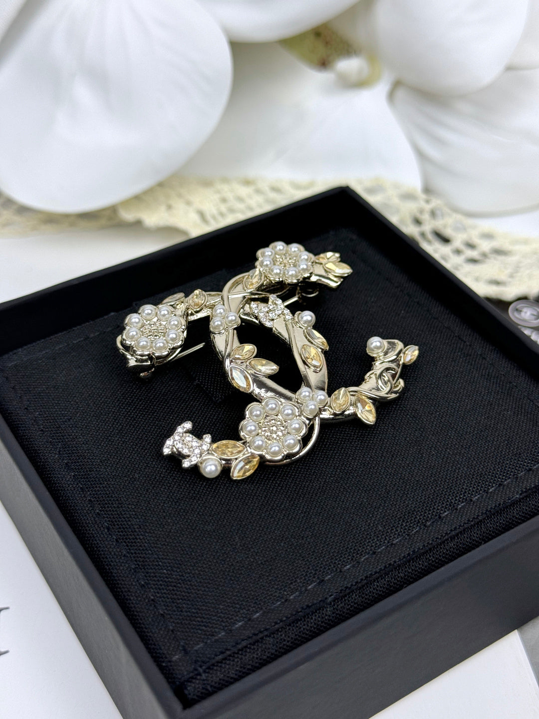 Floral Emblem Brooch with Stone Accents