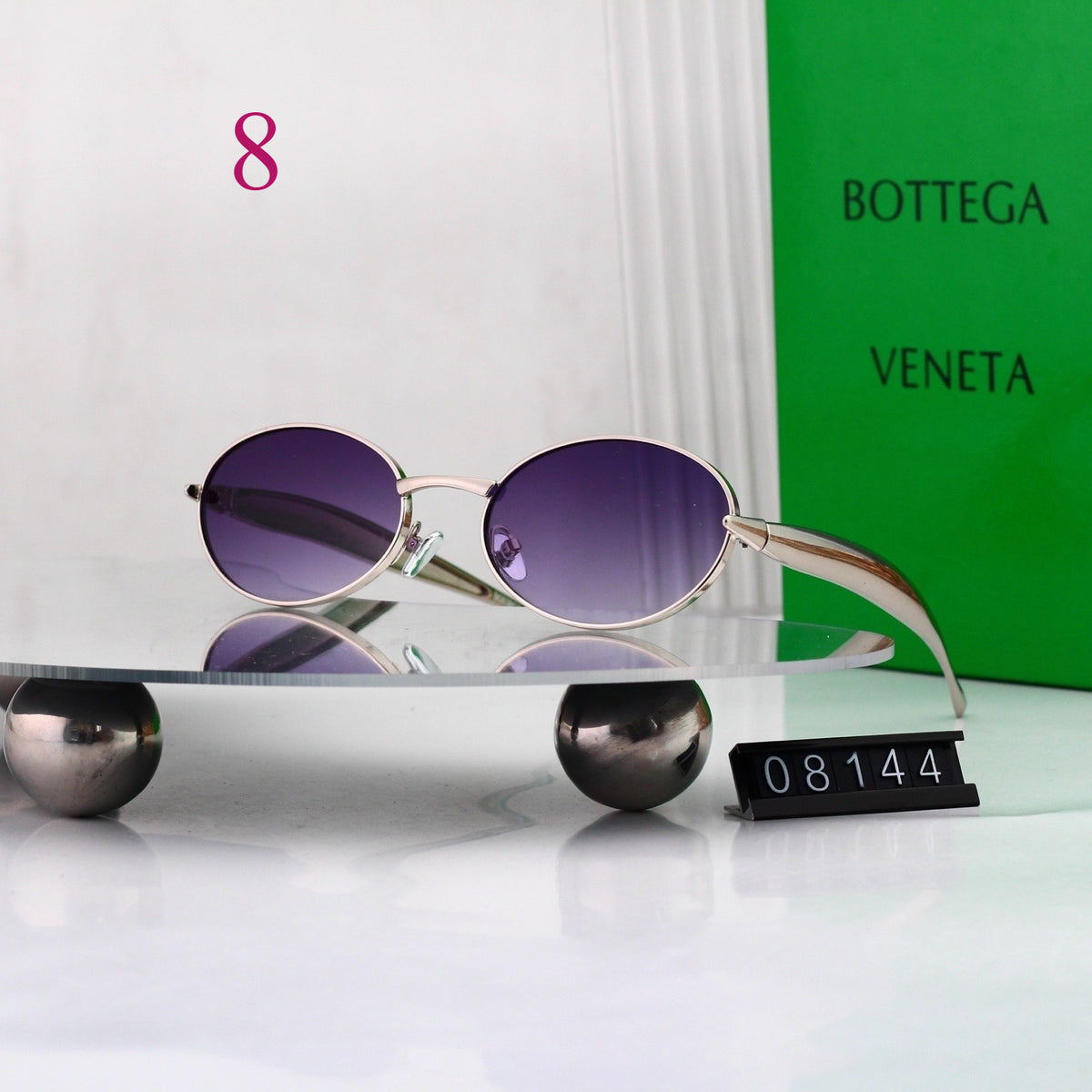 Gafas de sol redondas con patillas de metal texturizado