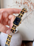 Montre à quartz rectangulaire dorée avec bracelet chaîne 001