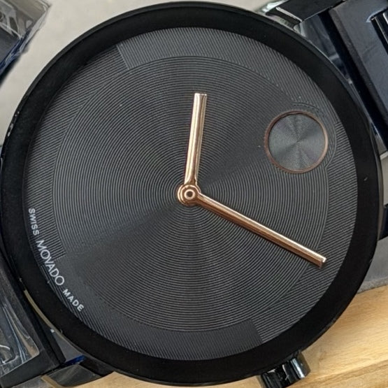 40 mm black watch with rose gold hands