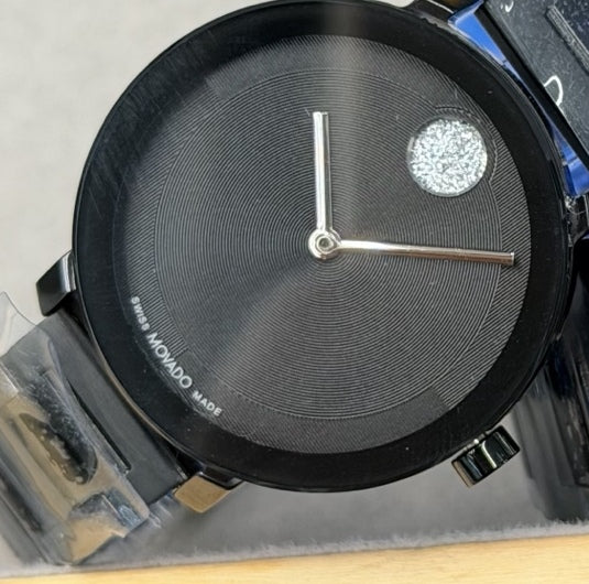 34 mm black watch with silver hands