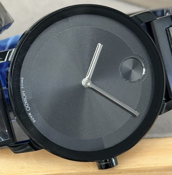 40 mm black watch with silver hands