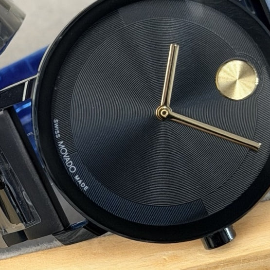 40 mm black watch with gold hands