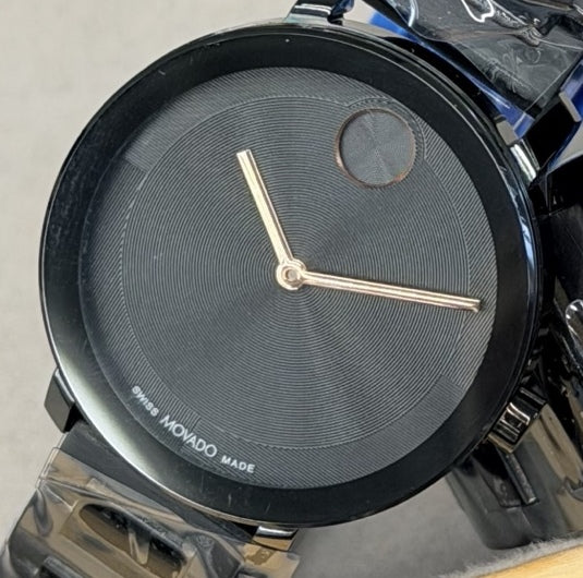34 mm black watch with rose-gold-tone hands