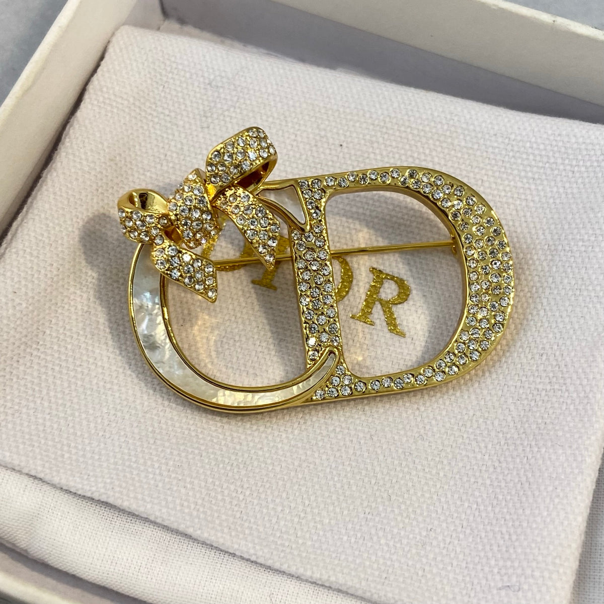 Bow & Letter Frame Brooch with Stone Accents