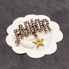 Lettered Stone-Set Brooch with Star Drop