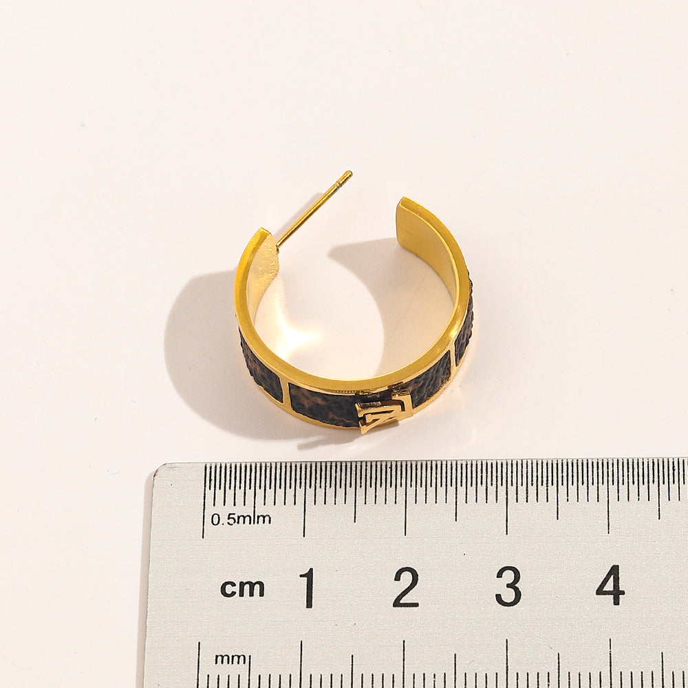 Boucles d'oreilles créoles en acier inoxydable 304 avec monogramme incrusté noir