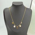 Collier floral et perles imitation nacre
