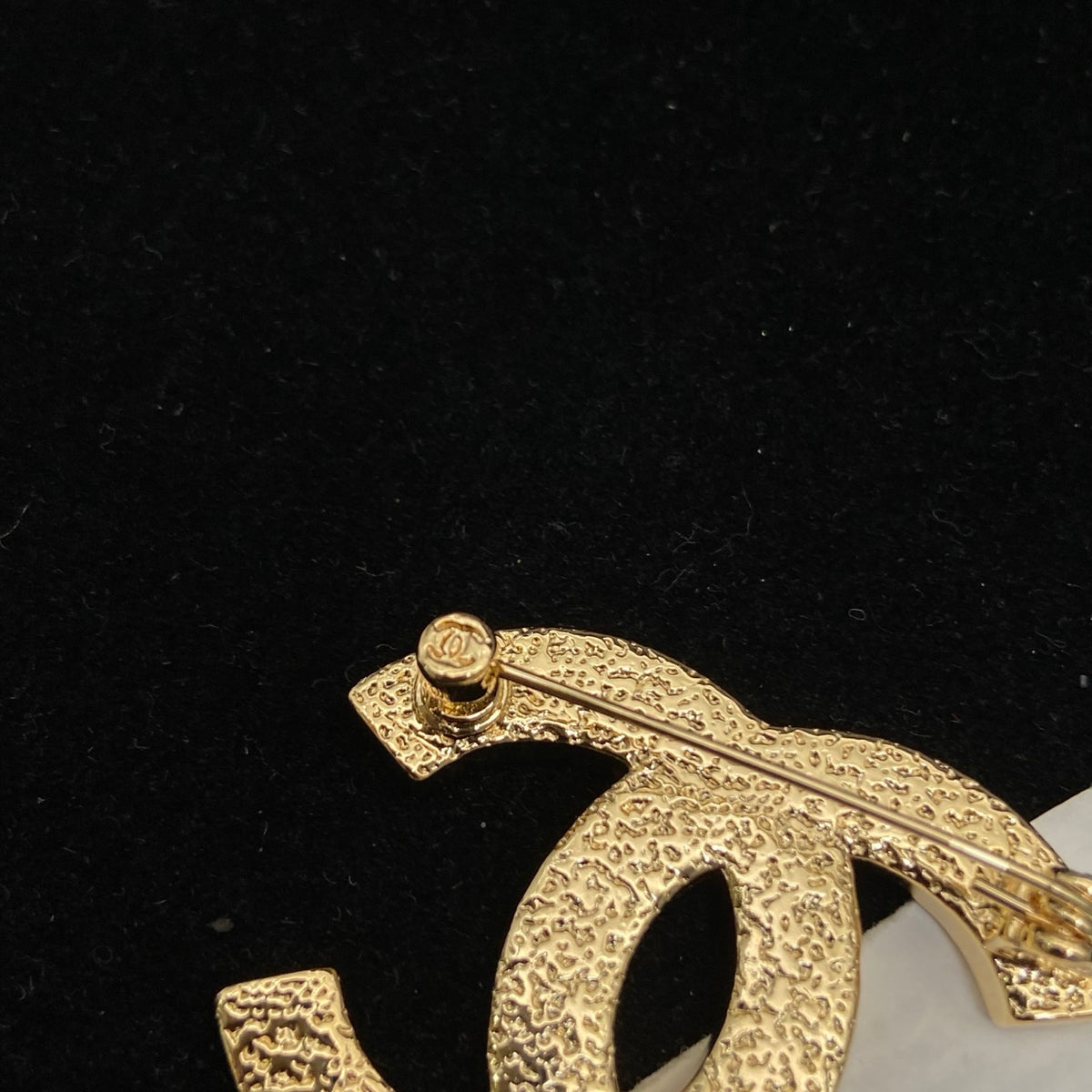 Textured Interlocking Emblem Brooch