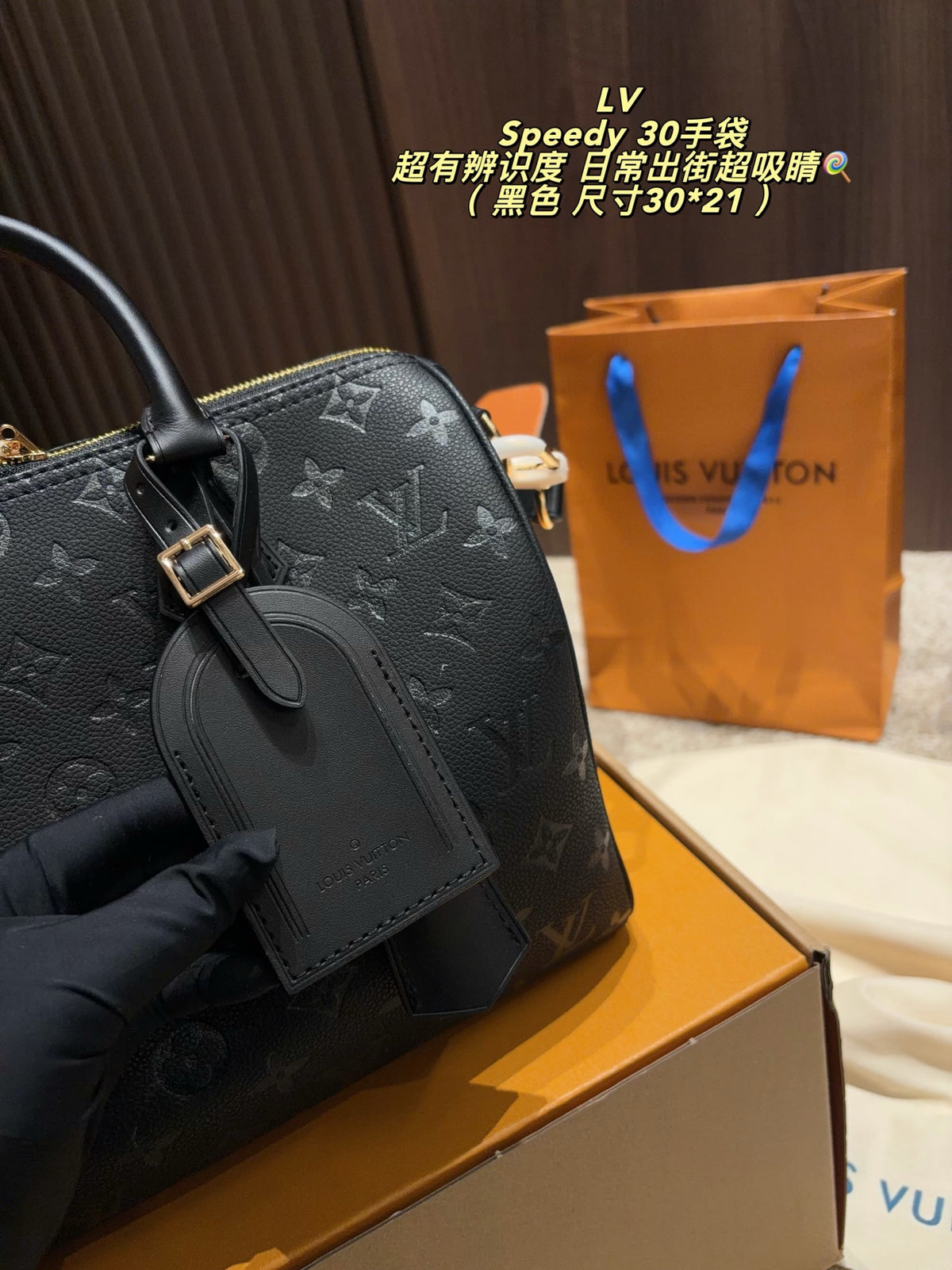 Embossed Monogram Top-Handle Barrel Bag — view 1