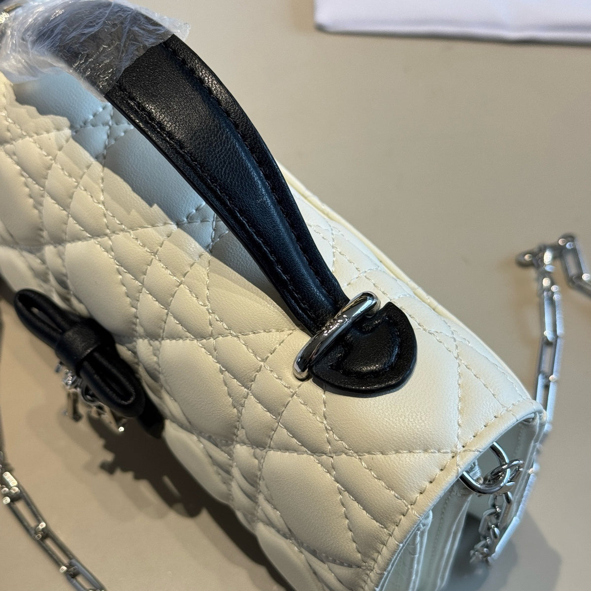 Quilted Chain Wallet with Bow Detail — view 7