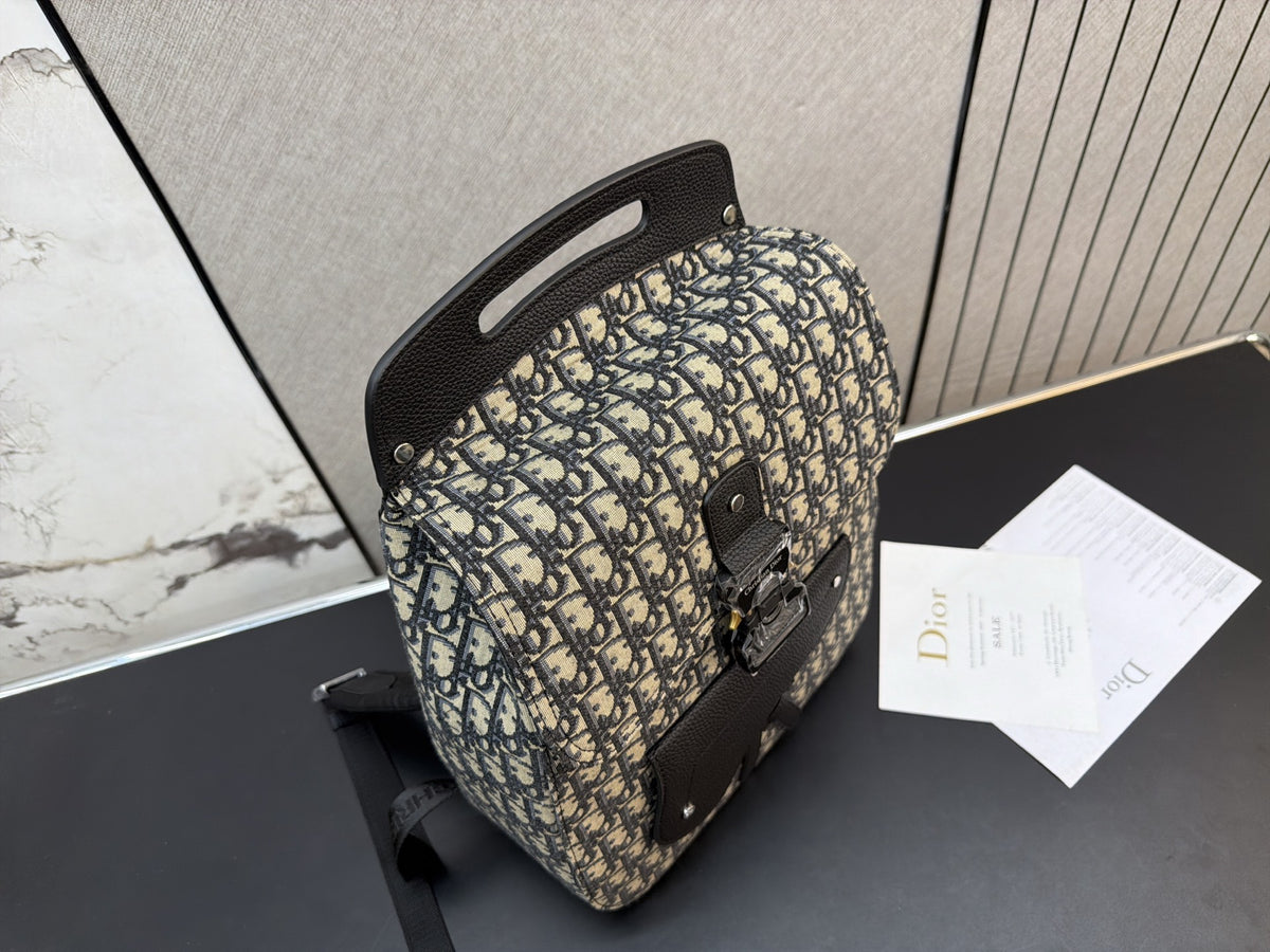 Monogram Buckle-Flap Backpack with Cutout Handle — view 1