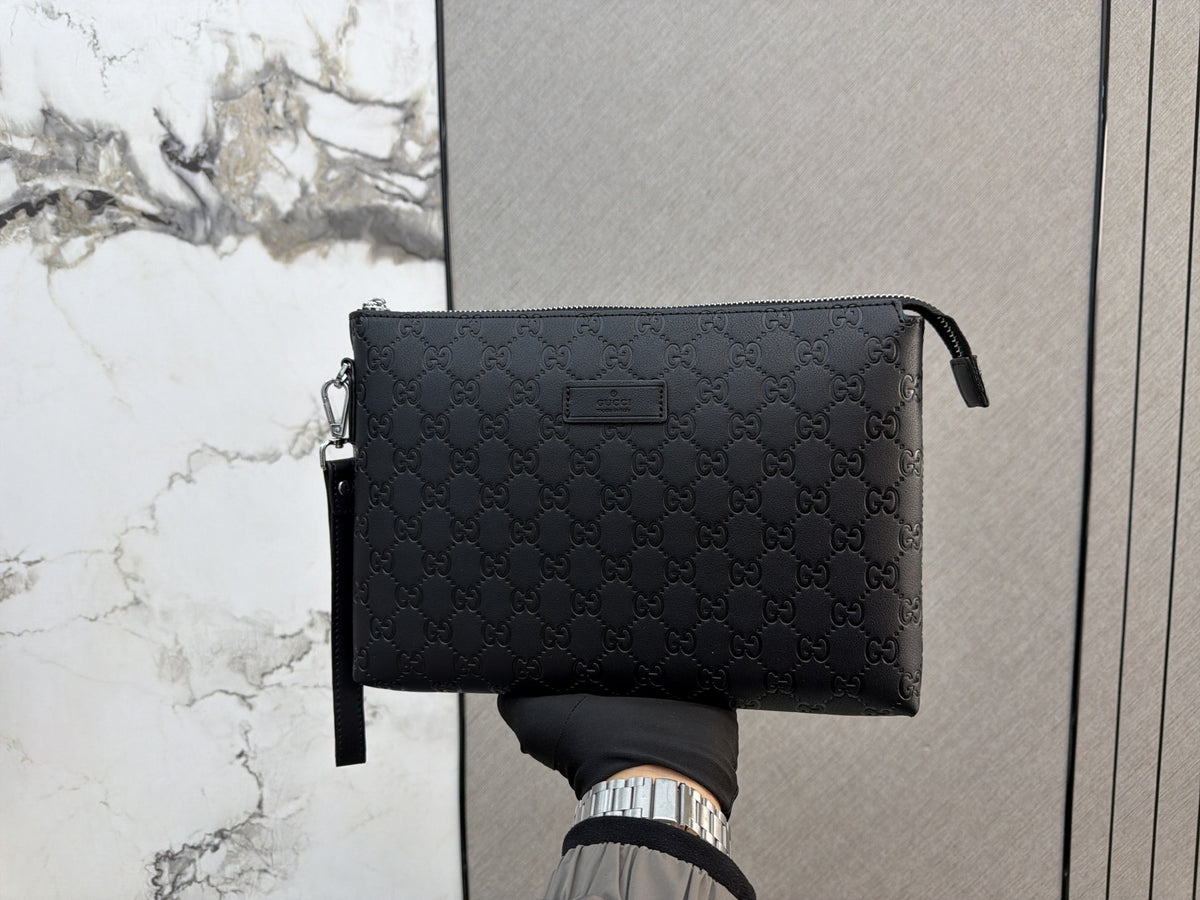 Black Embossed Monogram Zip Clutch — view 6