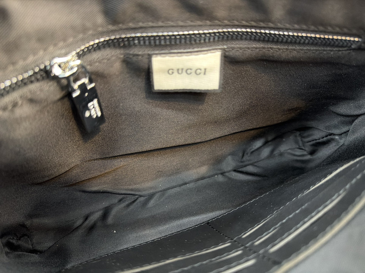 Black Embossed Monogram Zip Clutch — view 7