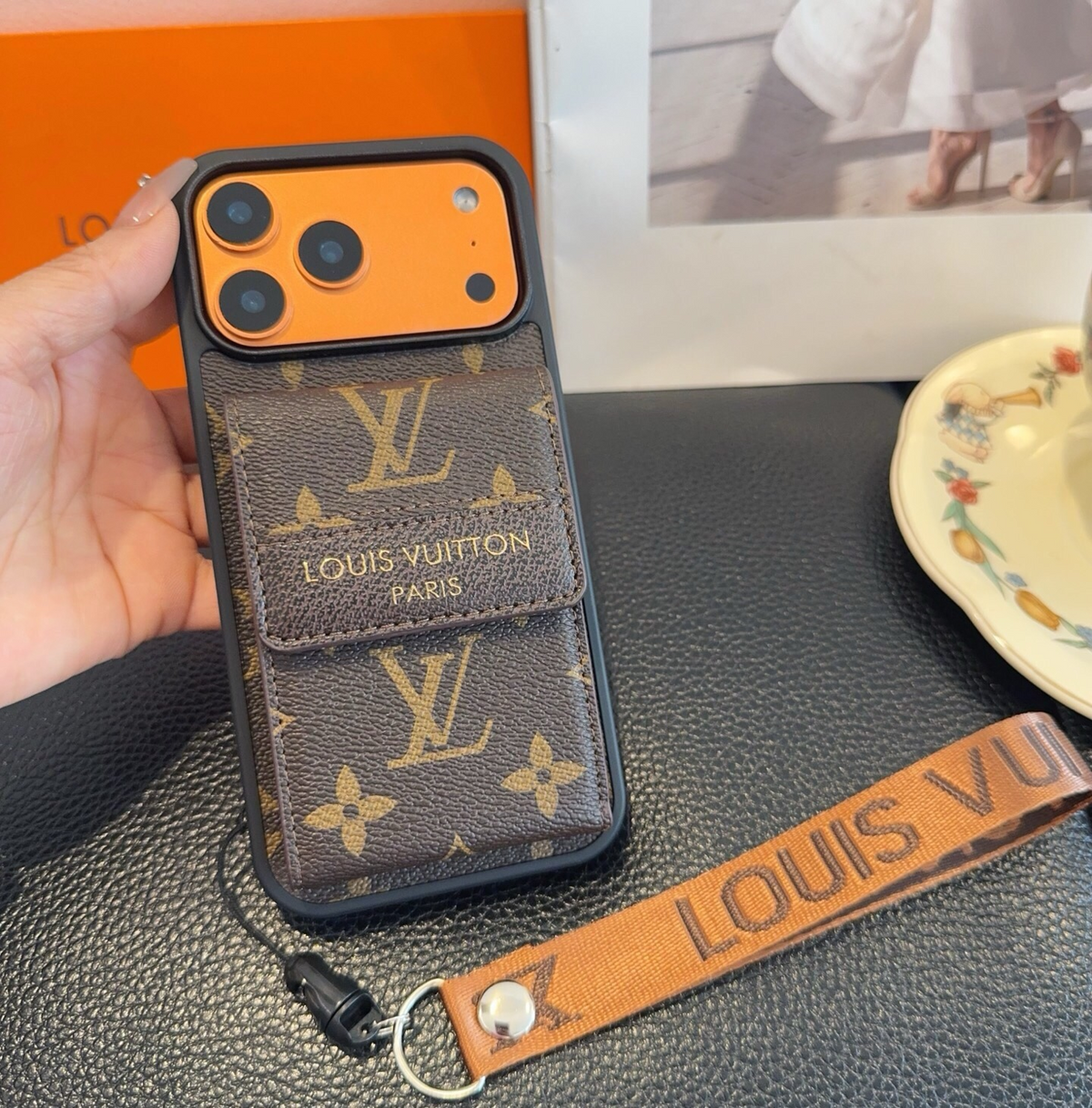 Brown monogram phone case with flap card pocket and matching wrist strap
