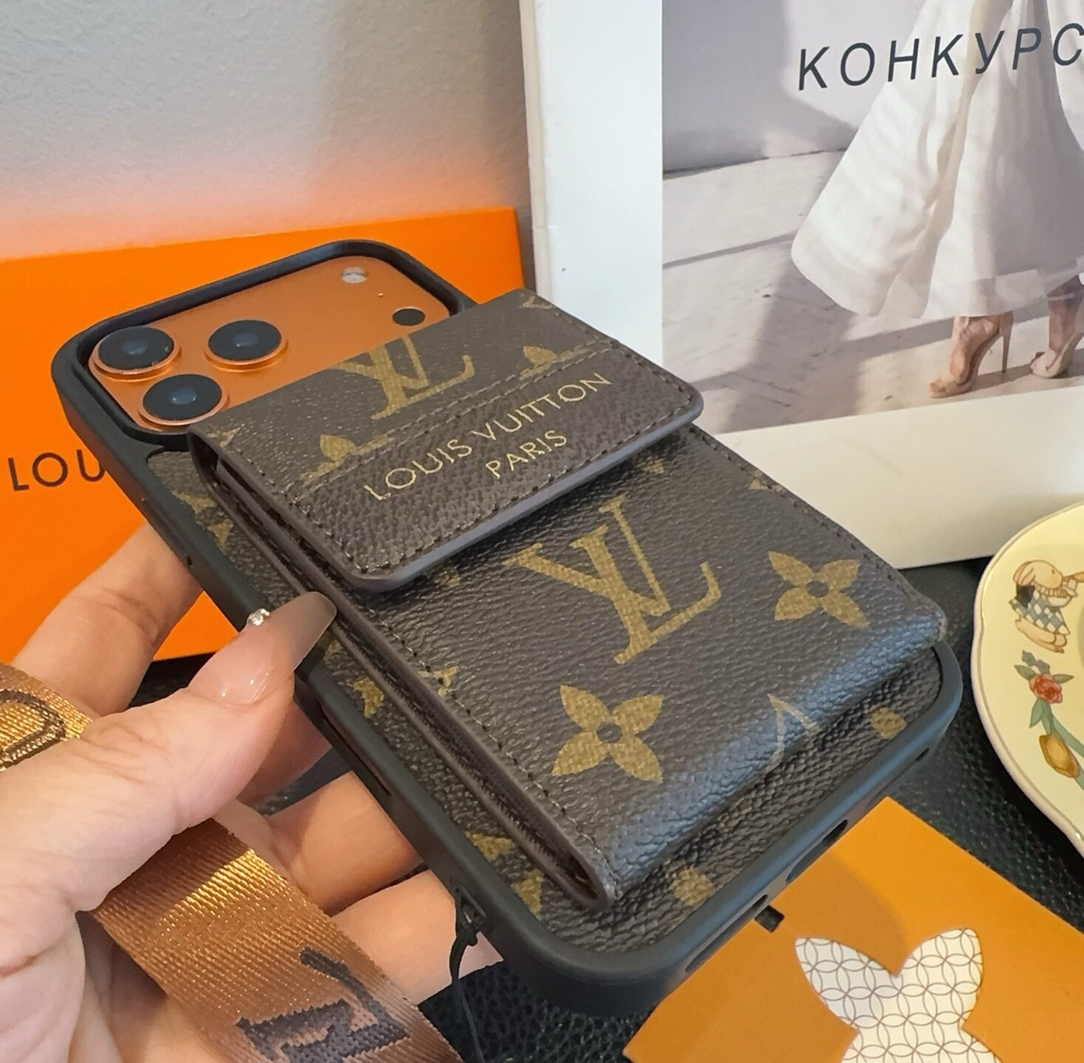 Brown monogram phone case flap pocket and side detail