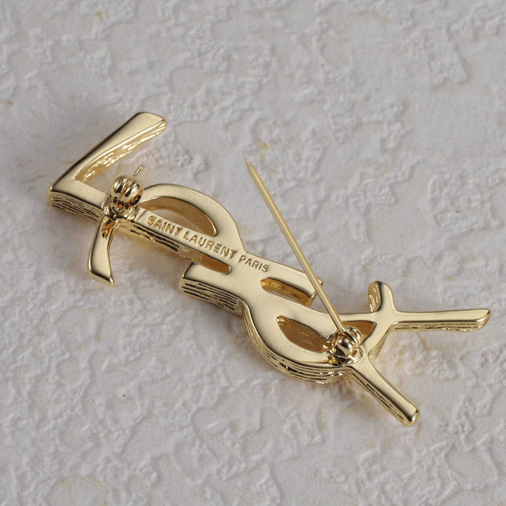 Broche con emblema de filigrana fina