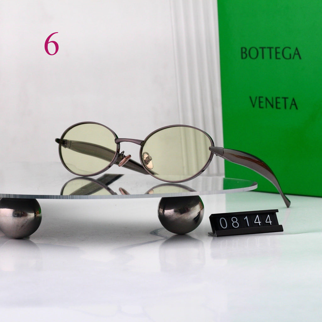 Gafas de sol redondas con patillas de metal texturizado