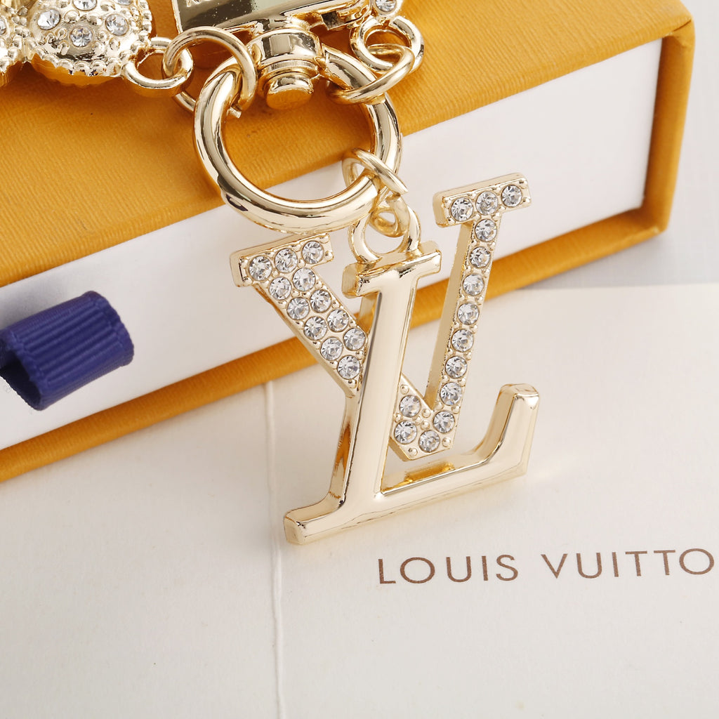 Porte-clés à breloque fleur scintillante et lettre