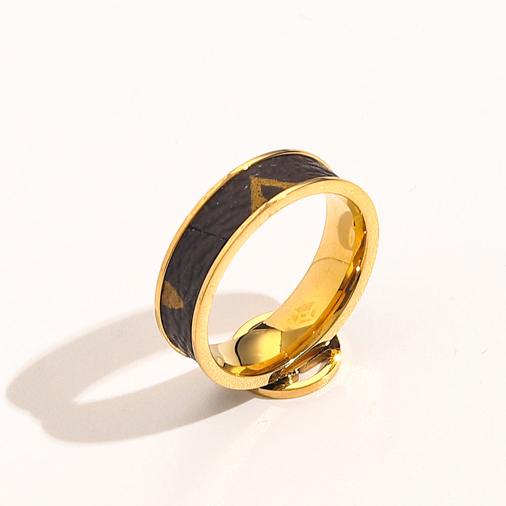 Bague ronde emblématique en acier inoxydable 304 avec incrustation noire