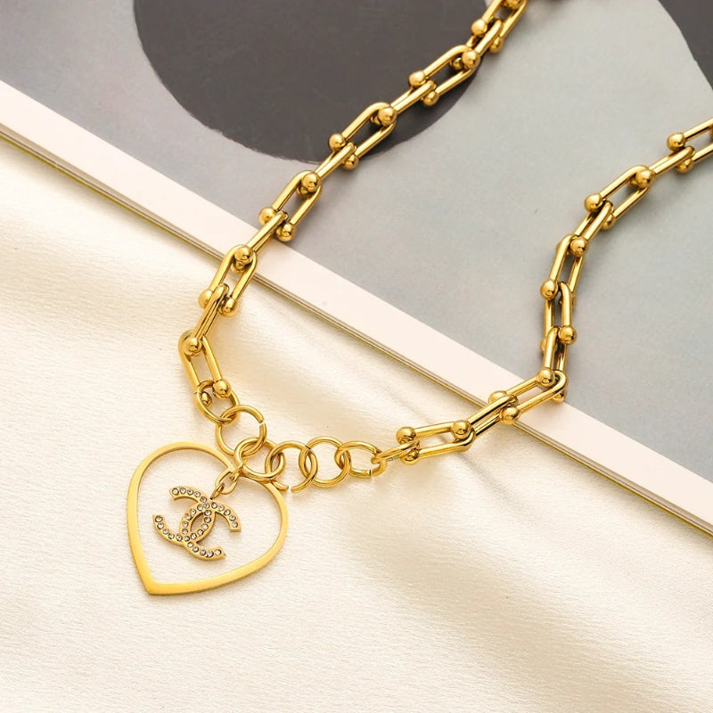 Collar de cadena tipo clip con corazón entrelazado en acero inoxidable 304