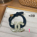 Sparkling Interlocking Emblem Hair Tie