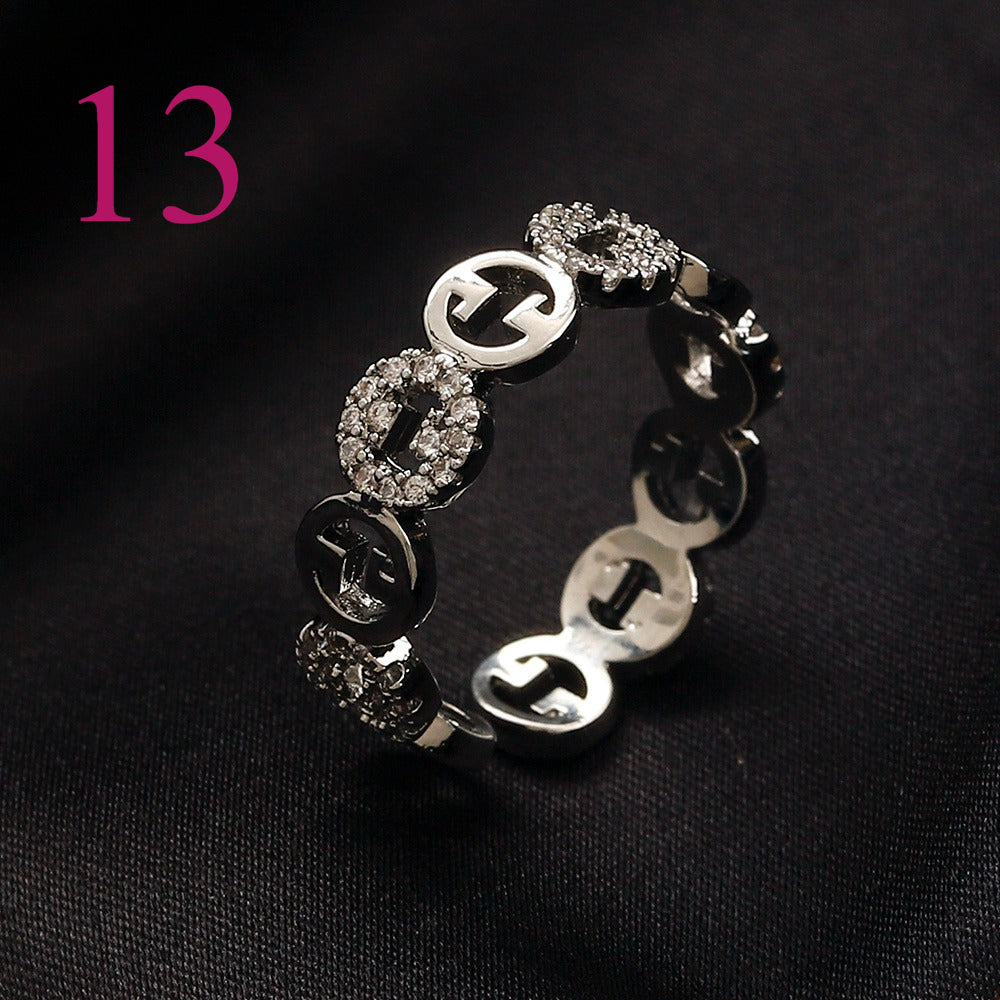 Textured Open Band Ring with Interlocking Emblem