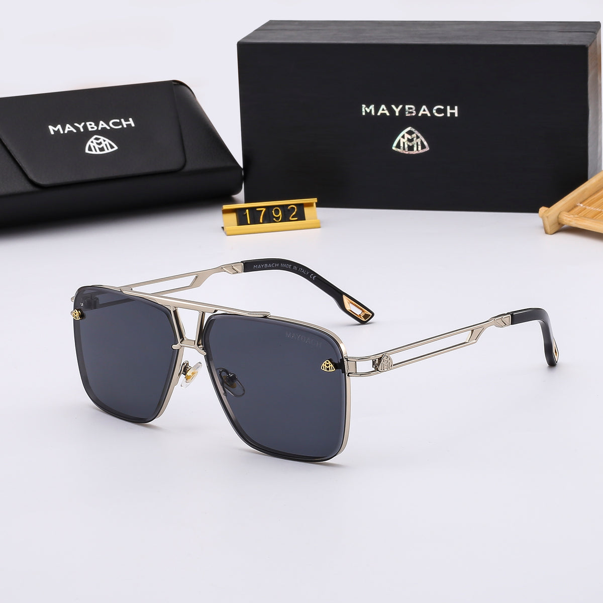 Gafas de sol geométricas estilo aviador con patillas metálicas troqueladas