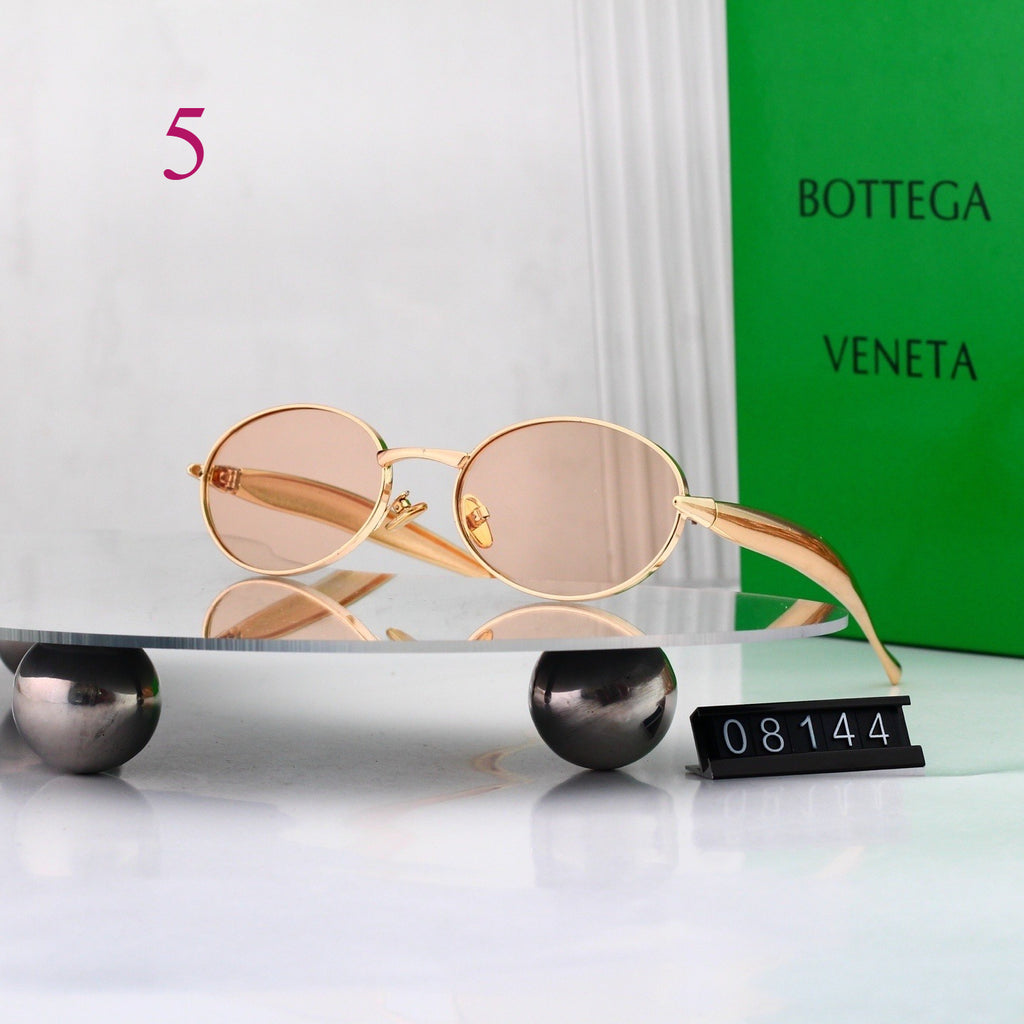 Gafas de sol redondas con patillas de metal texturizado