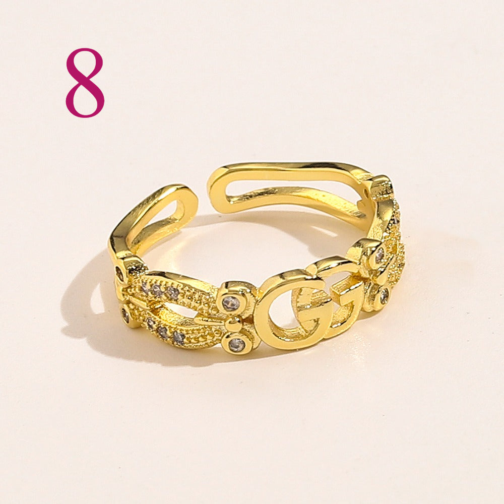 Textured Open Band Ring with Interlocking Emblem