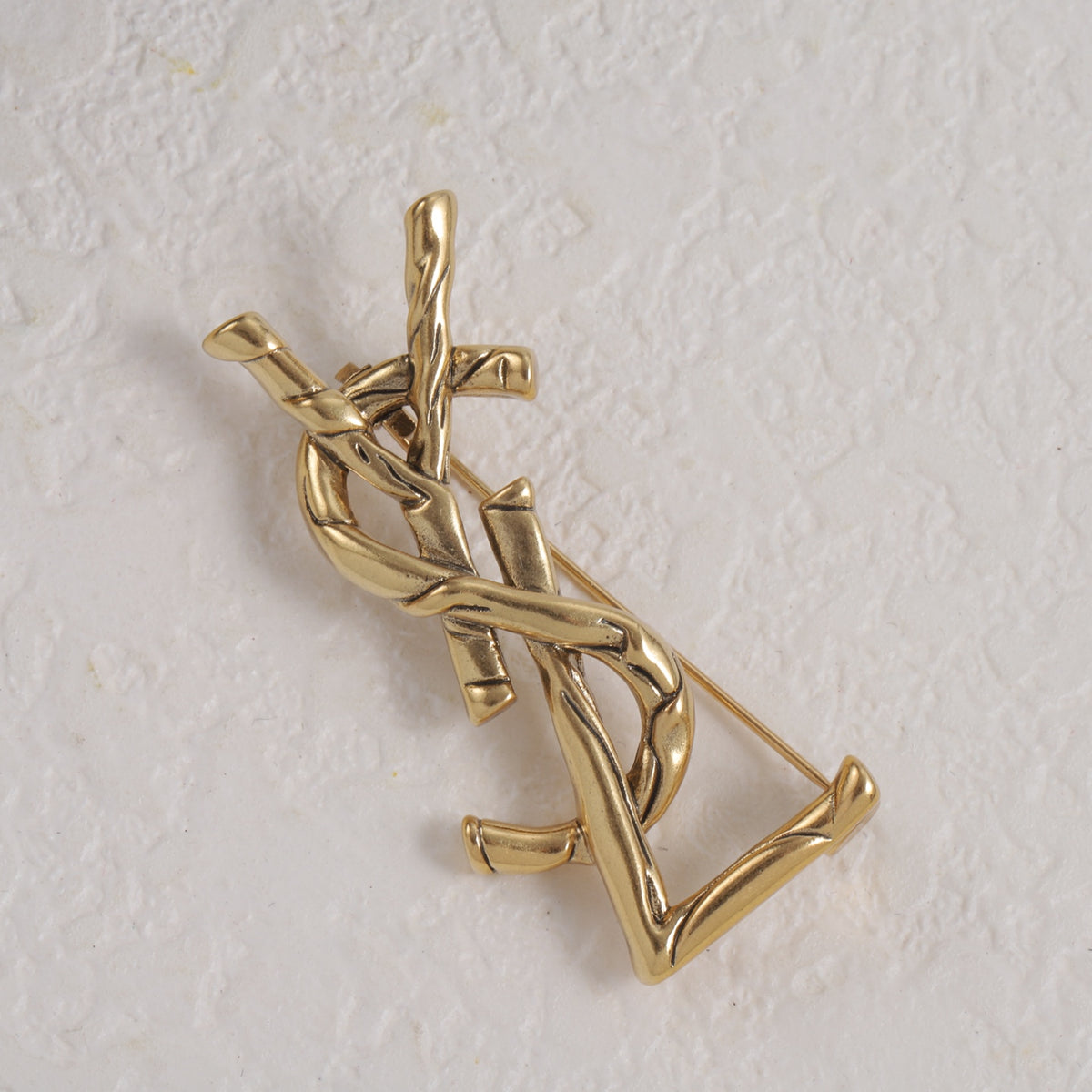 Twisted Letter Emblem Brooch
