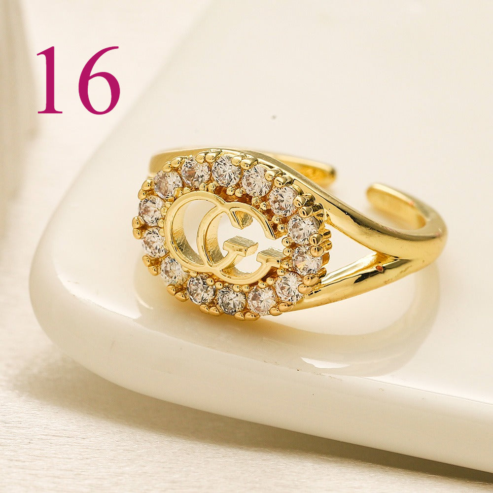 Textured Open Band Ring with Interlocking Emblem