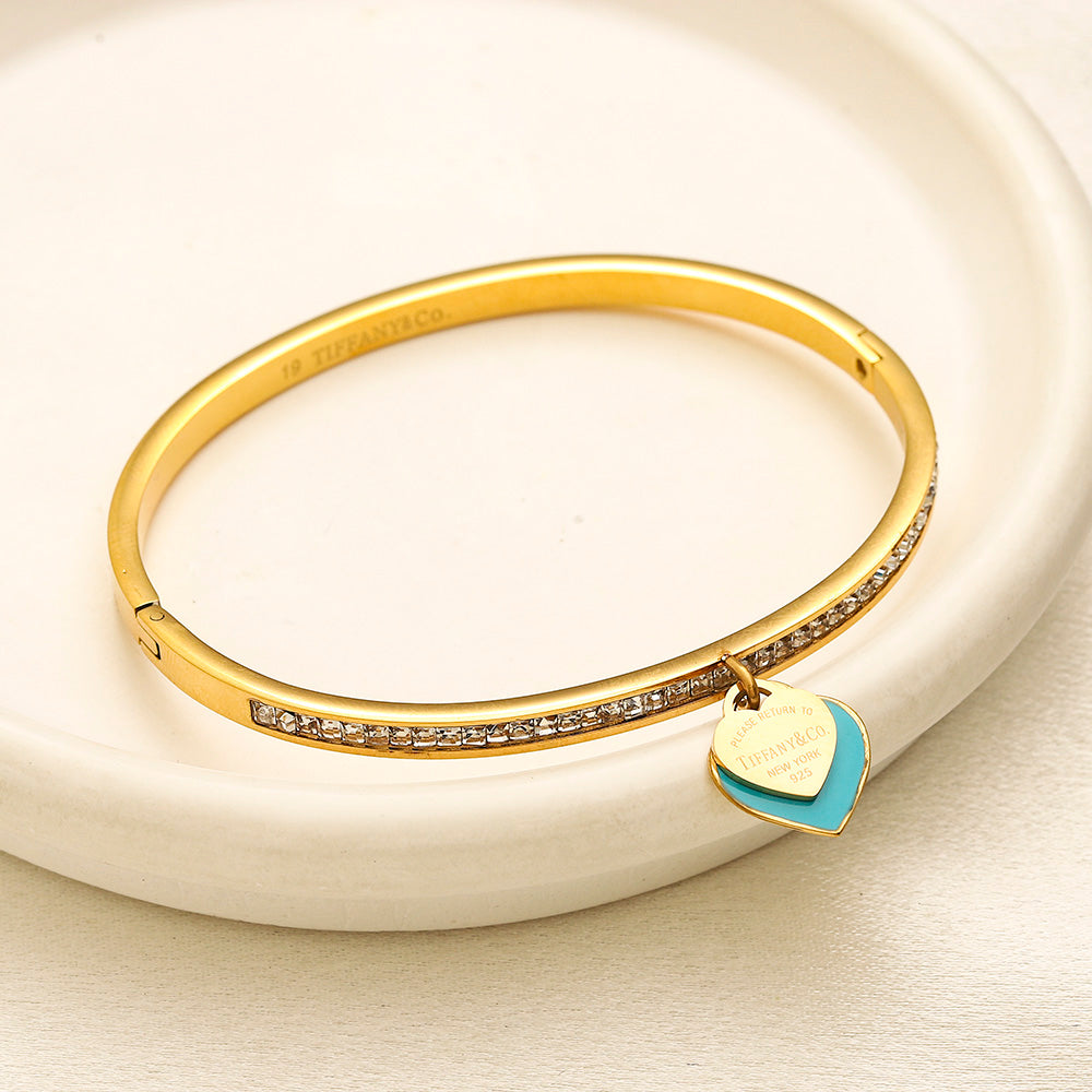Brazalete pavé de acero inoxidable 304 con dije de corazón de borde de color