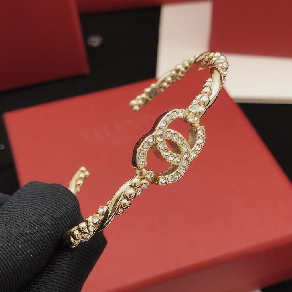 Bracelet manchette à maillons entrelacés pavés